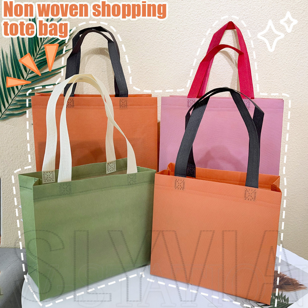 Slxc ถุงช้อปปิ้งไม่ทอกระเป๋าถือสิ่งแวดล้อมความจุขนาดใหญ่สีทึบเรียบง่ายหนาพับเก็บได้แบบพกพาภาชนะเก็บเดินทางกลางแจ้งถุงของขวัญเสื้อผ