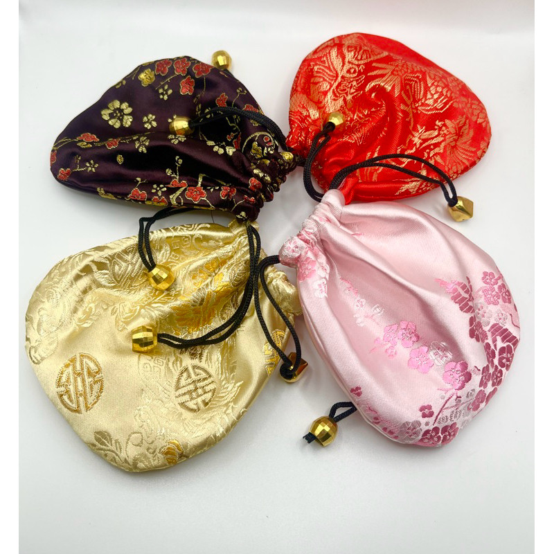 ถุงผ้ากำมะหยี่ลายดอกไม้ลายมังกรสั่งเยอะค่ะรายให้คะ