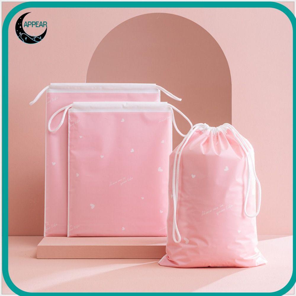 ปรากฏถุงเก็บสีฟ้าสีชมพูฝุ่น เชือกรูด ถุงบรรจุภัณฑ์สร้างสรรค์กันน้าหนาลายหัวใจกระเป๋าเดินทางรองเท้าบ้านเดินทางยิม