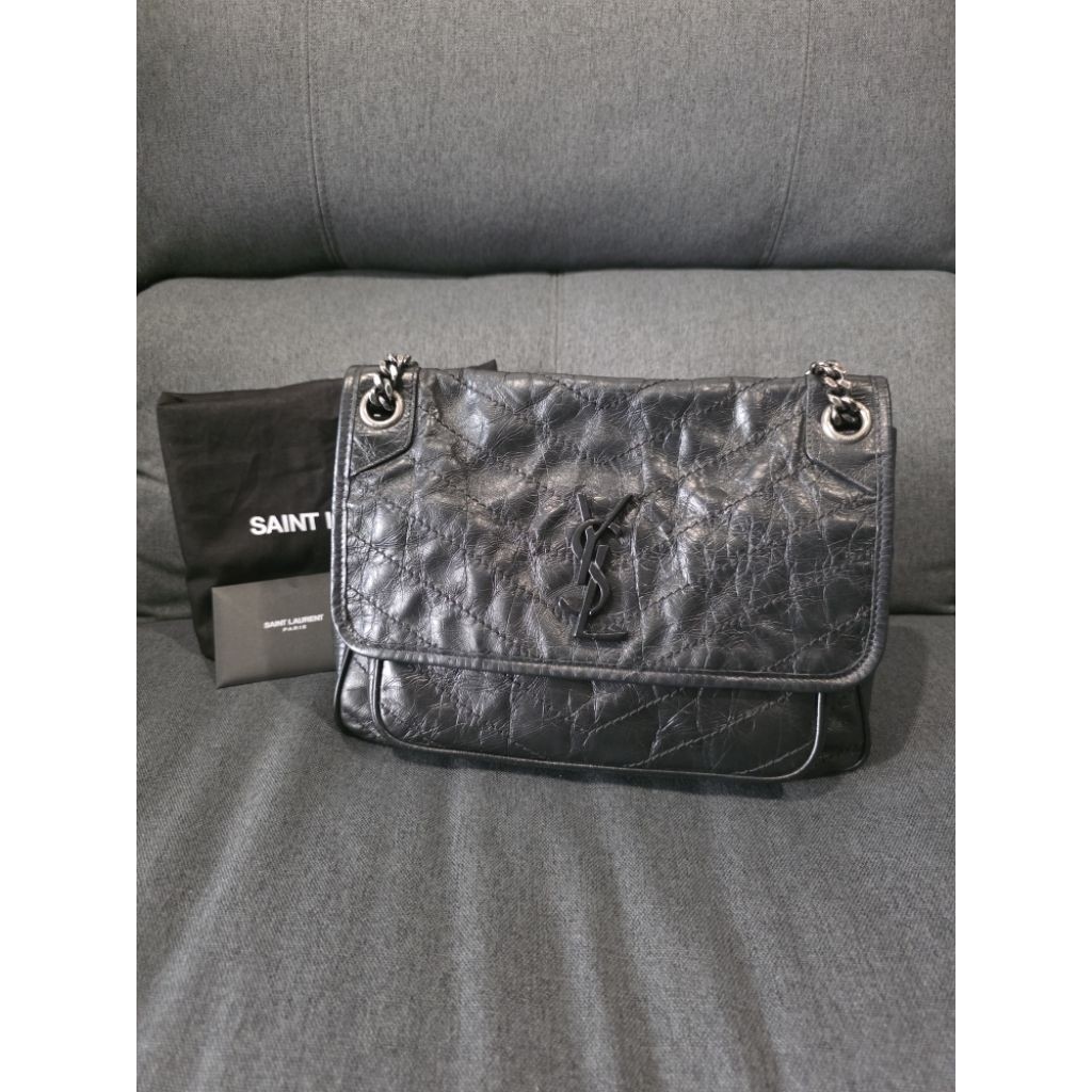 Used very good ysl niki medium y20