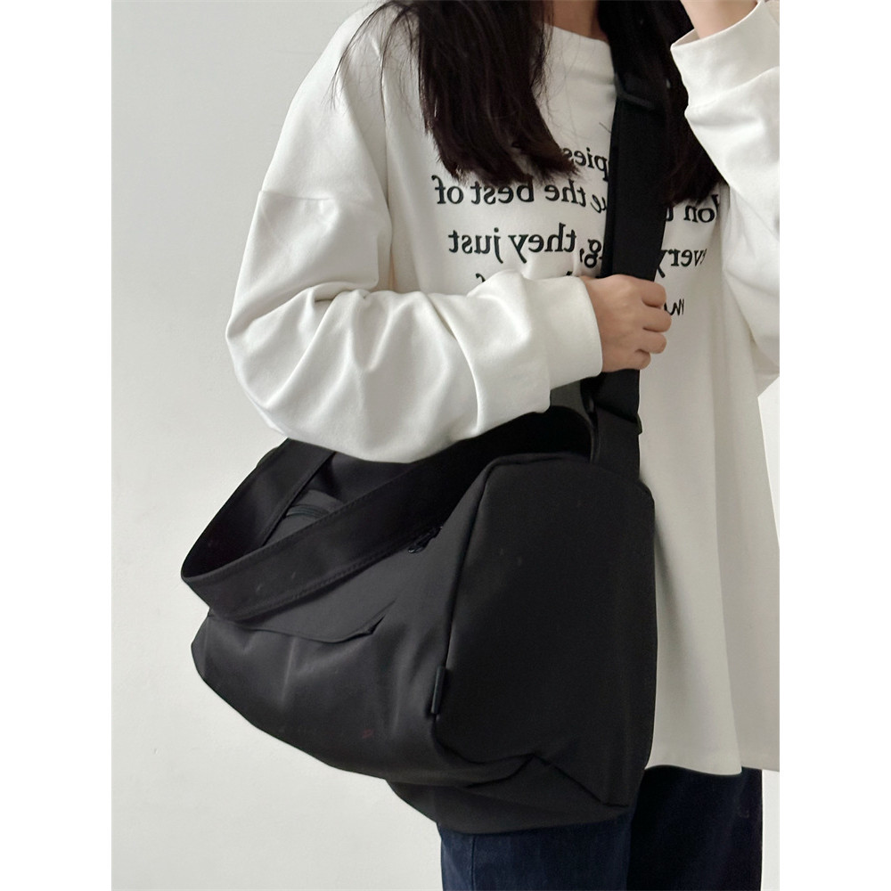 เวอร์ชั่นเกาหลีกระเป๋าเดินทางระยะสั้นขนาดใหญ่ความจุกระเป๋าสะพายหญิงน้าหนักเบากีฬาว่ายน้ายิมกระเป๋าชายกระเป๋าเดินทางเพิ่ม